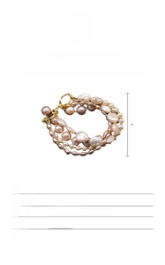 Macro view of multi-layer natural baroque freshwater pearls with 18K gold plated clasp