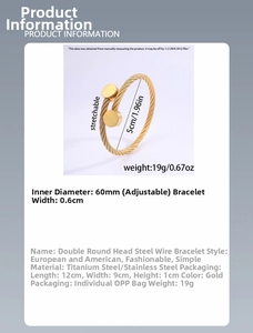 Detailed view of gold twisted wire bangle with double round heads and 60mm diameter