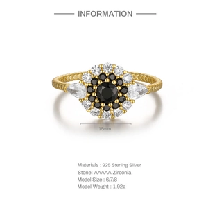 Detailed view of flower-shaped 925 silver ring with black gems and AAAAA cubic zirconia