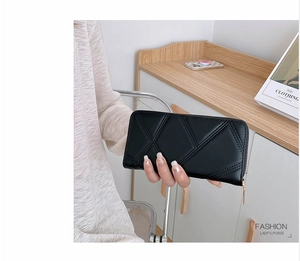 Black PU leather long wallet for women featuring geometric quilted pattern and zipper
