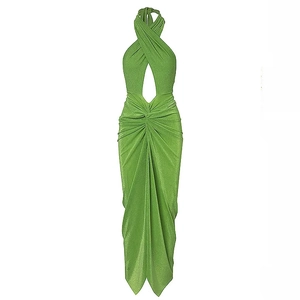 Detail of green halter neck dress with teardrop cutout and pleated waist knot texture