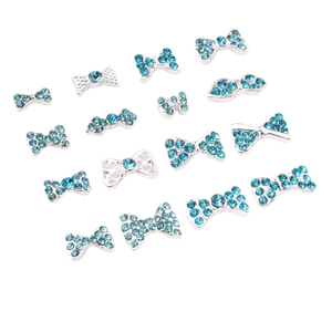Blue rhinestone bow nail art charms in silver alloy setting for manicure decoration