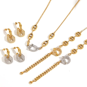 Luxurious stainless steel jewelry set with pavé zircon stones in gold and silver finish