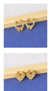 Detail of gold bow accent and heart embossed texture on hollow hoop earrings