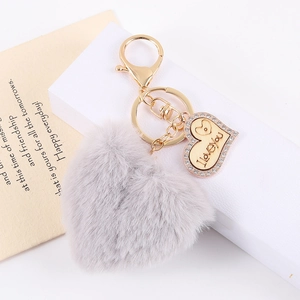 Grey plush heart keychain with gold ring and I Love You engraved crystal charm