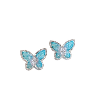 Boucles d'oreilles papillon en argent avec résine bleu menthe et pierres de zircon