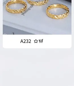 Detail of gold matelassé quilted pattern rings with luxury minimalist design
