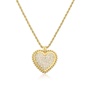 Detail of gold-plated cable chain necklace with micro-paved zircon heart pendant