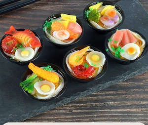 Detailed close-up of 6 miniature ramen bowls with realistic shrimp and vegetable toppings