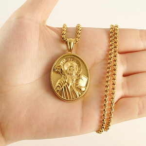 Detail of 18K gold stainless steel St. Benedict oval pendant necklace with 3D relief