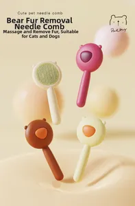 Detail of bear-shaped pet grooming brushes with push-button cleaning in four pastel colors