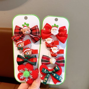 Christmas hair clips set featuring snowman, reindeer, and bow designs for girls
