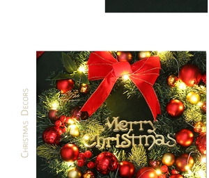 Detail of Christmas wreath with pine cones, red ornaments, and warm LED light strings