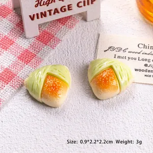 Miniature resin zongzi figurine for DIY crafts with dimensions of 0.9x2.2x2.2cm and 3g weight