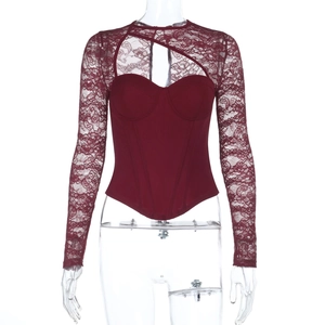 Detail of burgundy lace top featuring floral patterns and sexy cutout chest design