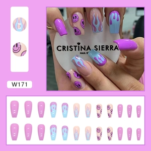 Purple Y2K press-on nails set featuring flame patterns and cute smiley face designs