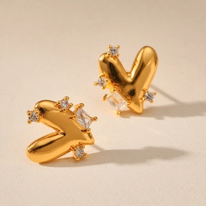 Polished 18K gold heart earrings with micro-paved rectangular and round zircon stones