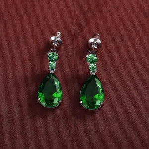 Elegant emerald-green pear-cut cubic zirconia drop earrings with silver-tone setting