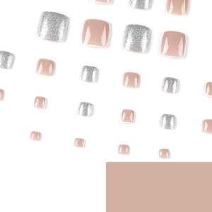 Press-on toenails set featuring nude pink finish and silver glitter gradient styles