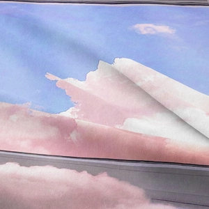 Macro view of woven landscape tapestry fabric with detailed blue and purple sky print