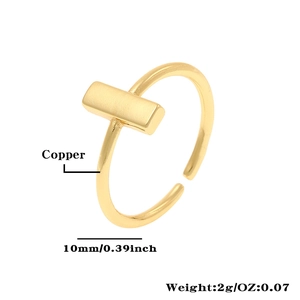 Detailed view showing the 10mm rectangular top and 2g weight of the golden copper ring