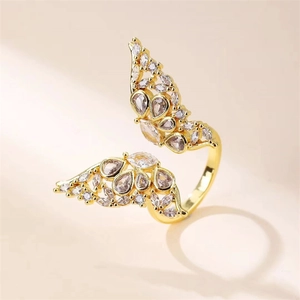 Golden butterfly open ring with sparkling crystal zircons in a trendy minimalist style