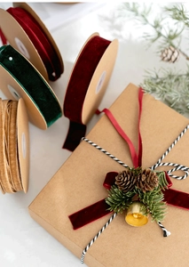 Velvet ribbons in burgundy, dark green, and camel for DIY Christmas gift box wrapping