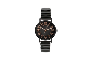 Detail of black quartz watch with rose gold Arabic numerals and flexible stretch band
