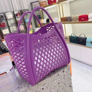 Detail view of purple hollow silicone tote bag with large capacity for beach and shopping