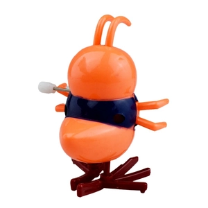 Mechanical wind-up colorful insect toy with orange body and blue accents on white background