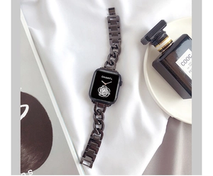 Macro shot of gunmetal chain link watch band on a square smartwatch with h-link design