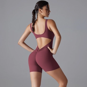 Detail view of the deep red backless yoga bodysuit with scrunch butt lifting effect