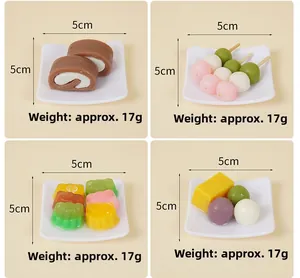 Miniature food model set featuring Swiss rolls and dango charms with 5cm square plates