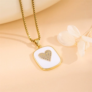 Golden square necklace with white enamel inlay and sparkling diamond heart pendant