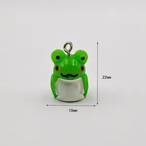 Detail showing 22mm x 15mm dimensions of a green cartoon frog acrylic pendant
