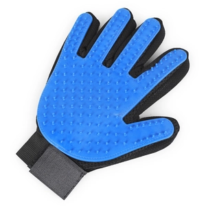 Detailed view of blue silicone pet grooming glove with massage nubs and mesh fabric