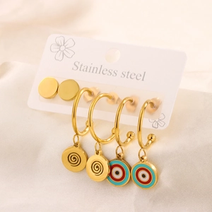 Detail of 18K gold plated stainless steel earring set with evil eye enamel charms