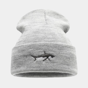 Close-up of gray knit beanie featuring high-quality black shark embroidery on the cuff