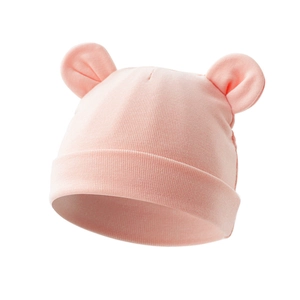 Detail showing the pink knit cotton baby hat with cute soft round Mickey ears decor