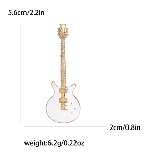 White and gold enamel guitar brooch pin with measurements 5.6cm by 2cm for rocker fashion
