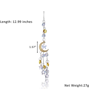 Crystal moon and star suncatcher with dimensions and weight on white background