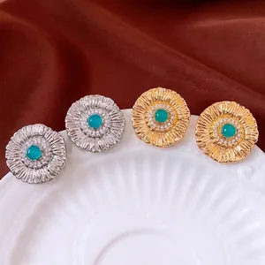 Vintage sunburst zircon earrings with turquoise center in gold and silver finish