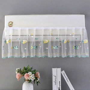 Detailed close-up of white lace air conditioner cover featuring colorful fish embroidery