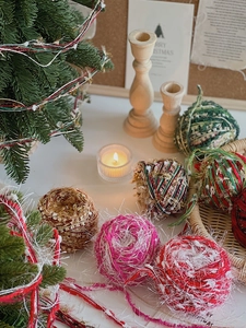 DIY Christmas tree yarn ball set with red and green wool ribbons for holiday flower decor