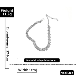 Detail view of multi-layer rhinestone choker with adjustable lobster clasp and extension chain