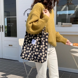 Floral corduroy tote bag with patch showing high capacity and stylish casual texture