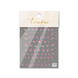 Dettaglio di adesivi per unghie con tulipani rosa ed effetto diamante sui fiori