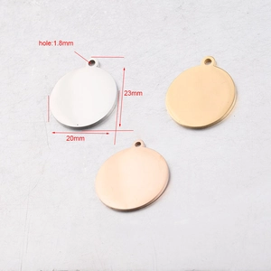 Detail view of 20mm mirror polished stainless steel blank discs with dimension labels