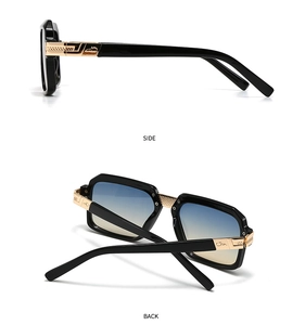 Detail of vintage square sunglasses with gold hollow metal temples and gradient lenses