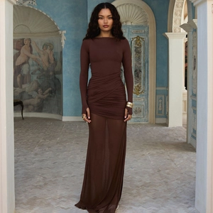 Detail of dark brown long sleeve dress with ruched bodice and sheer mesh skirt detail
